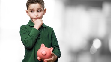 Educaţie financiară: 4 lucruri pe care să le spui copilului